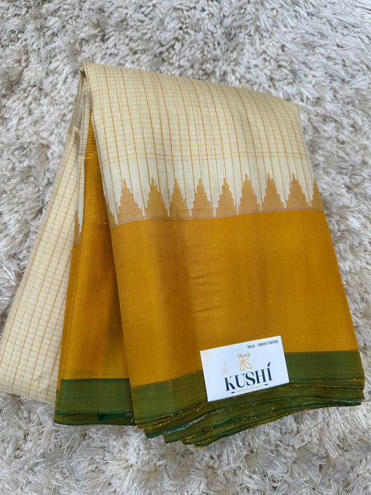 Cream with yellow Gadwal pattu saree
