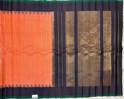 Gadwal pattu checks with plain temple border saree